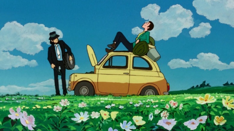 Lupin atop a small car