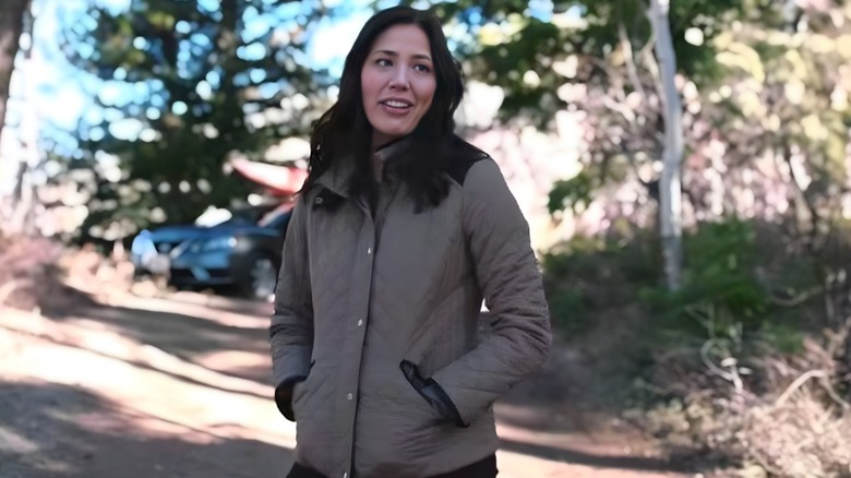 Sarah Nguyen standing with her hands in her pockets in Yellowstone