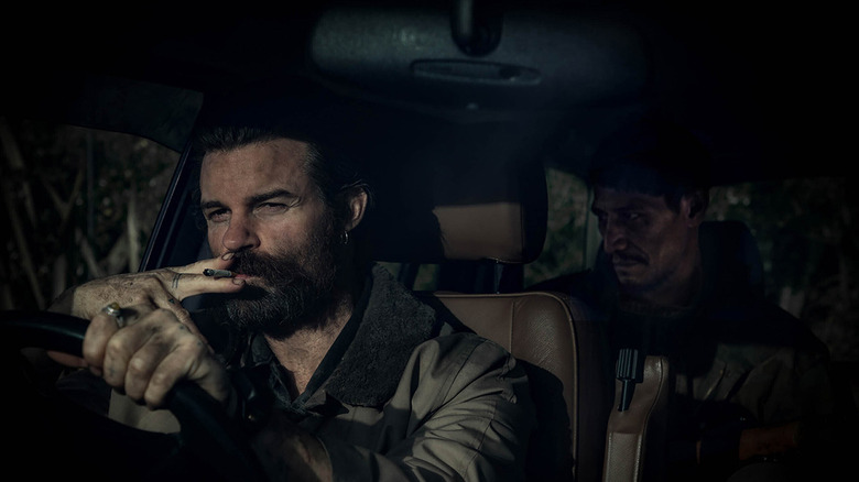 Daniel Gillies drives smokes cigarette