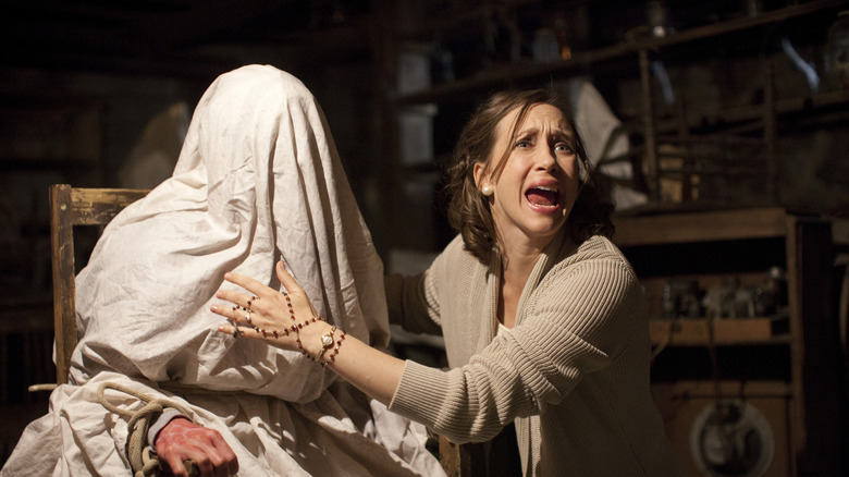 the conjuring vera farmiga conducts exorcism