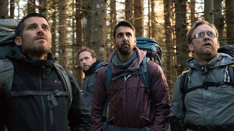 lost campers stare at sky in The Ritual