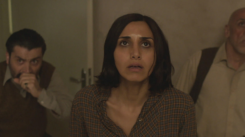 scared woman in Under the Shadow