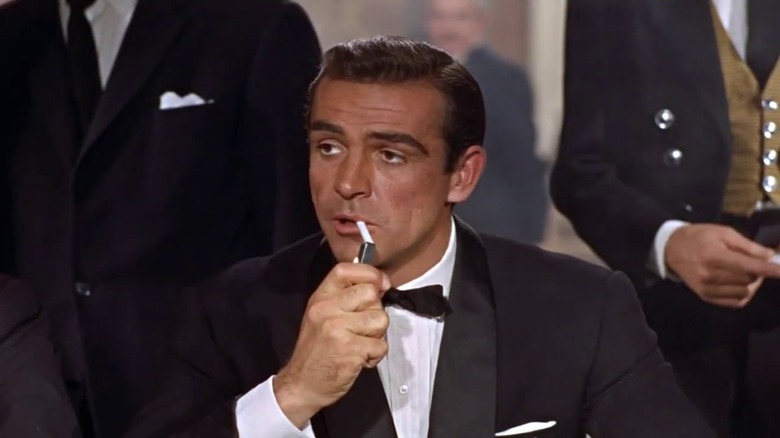 James Bond lights cigarette