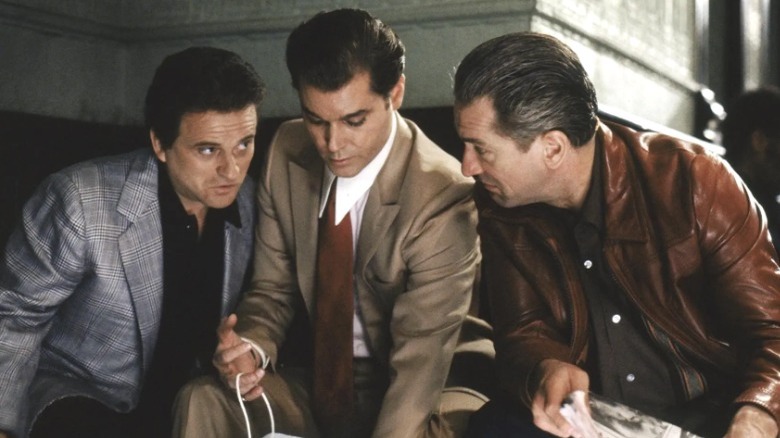 Liotta and crew confer on a plan.