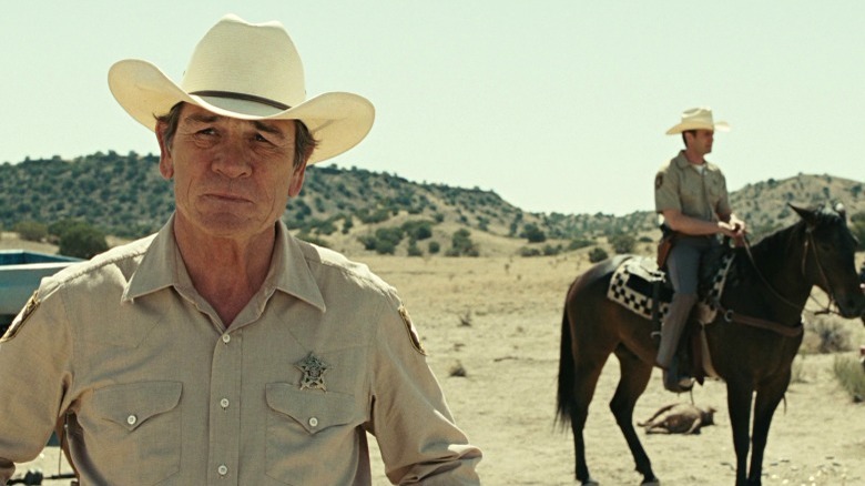 The sheriff inspects a drug deal gone wrong in No Country for Old Men