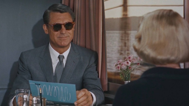 Cary Grant undercover on a train in North by Northwest