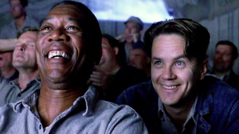 Red and Andy enjoy a movie in The Shawshank Redemption