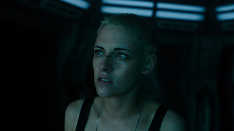 Kristen Stewart short blonde hair cut on nose covered in water