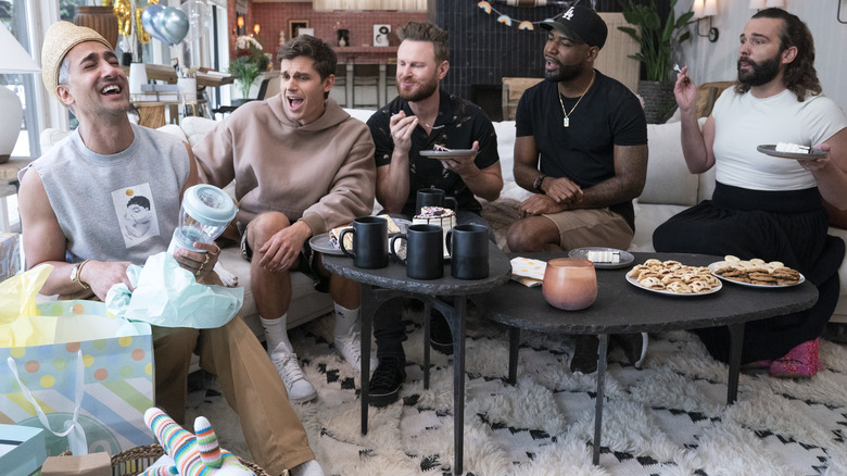 The Queer Eye gang celebrates with snacks