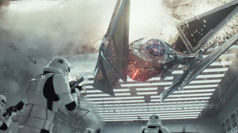 Stormtroopers firing up at a stolen TIE Avenger