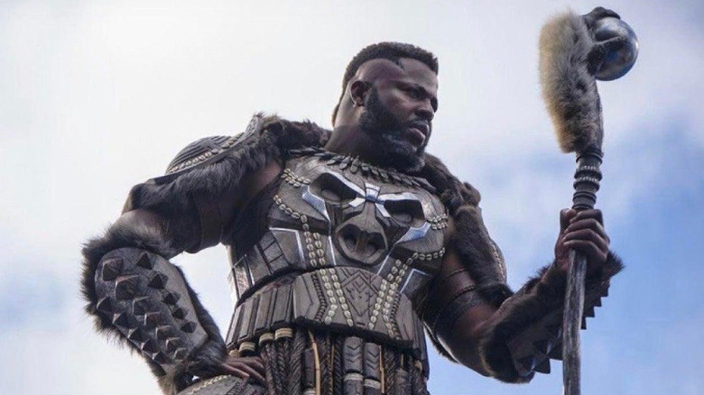 Black Panther: Wakanda Forever's M'Baku staring with walking stick