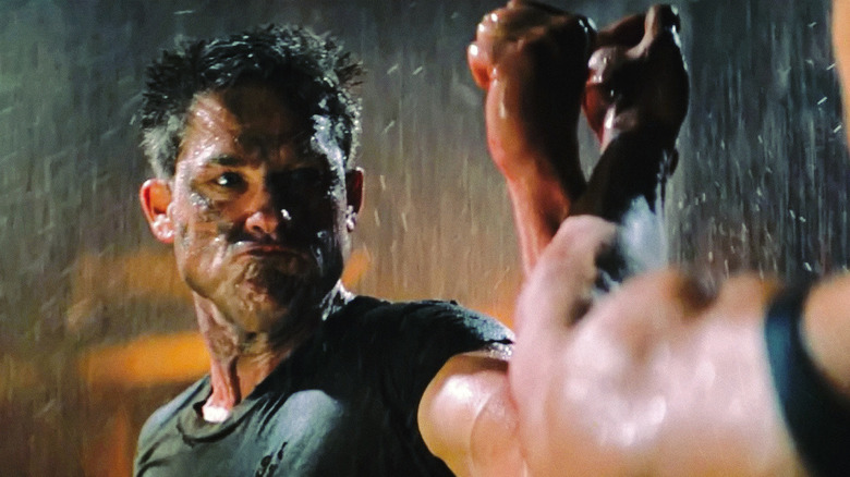 Todd fighting in rain in Soldier