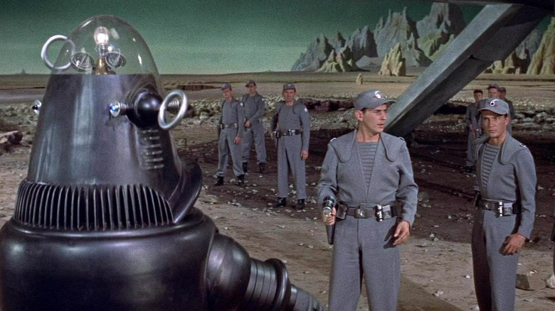 Robot greets soldiers on distant planet