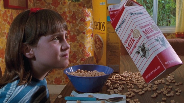 Girl uses telekinesis to pour milk