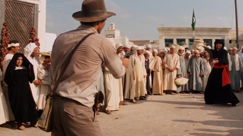 Indiana Jones shoots swordsman