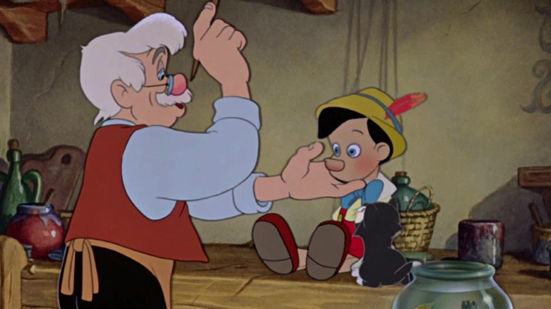 Geppetto paints Pinnochio