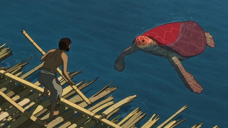 Man on raft sees red turtle