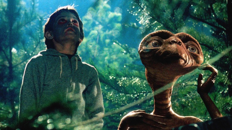 Henry Thomas and E.T.,