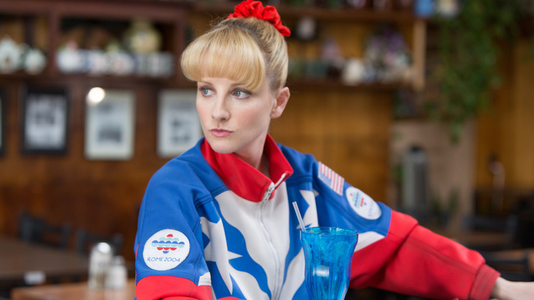 Melissa Rauch as Hope sitting at the bar in The Bronze