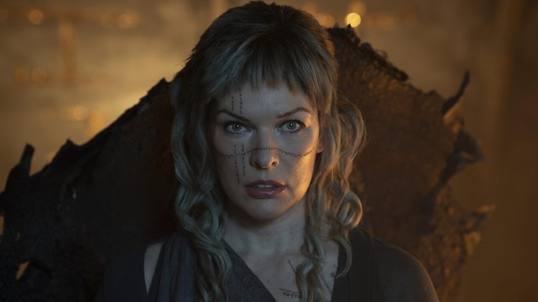 Mila Jovovich's Gray staring into the distance from In the Lost Lands