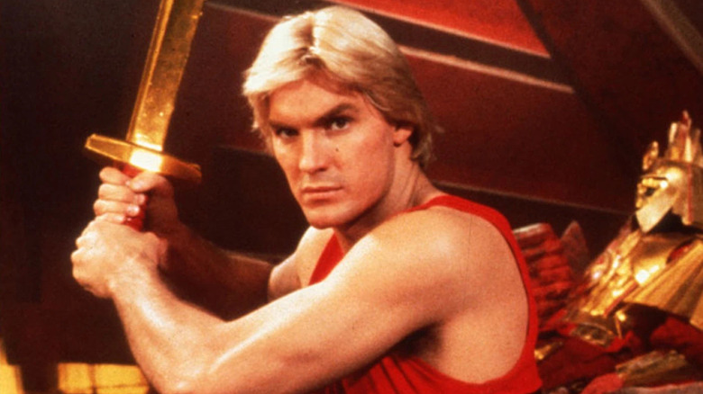 Flash Gordon brandishing his sword 