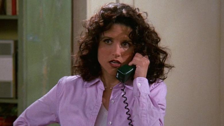 Julia Louis-Dreyfus like Elaine Benes on the phone on Seinfeld