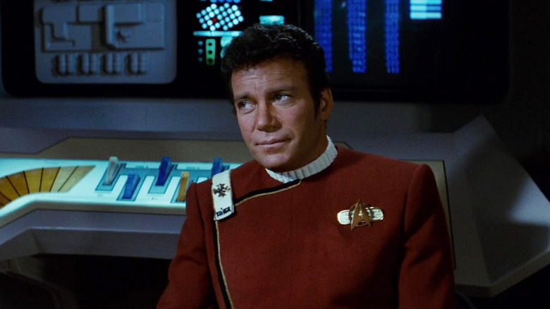 William Shatner as Kirk sitting on a starship in Star Trek II: The Wrath of Khan