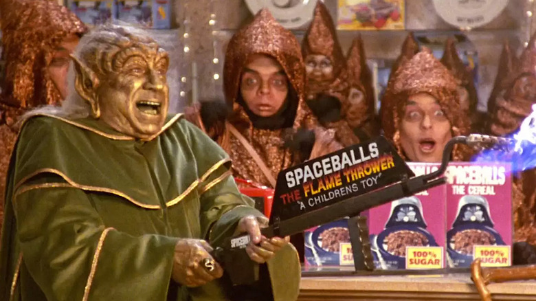 Iogurte atirando em um lança-chamas em Spaceballs