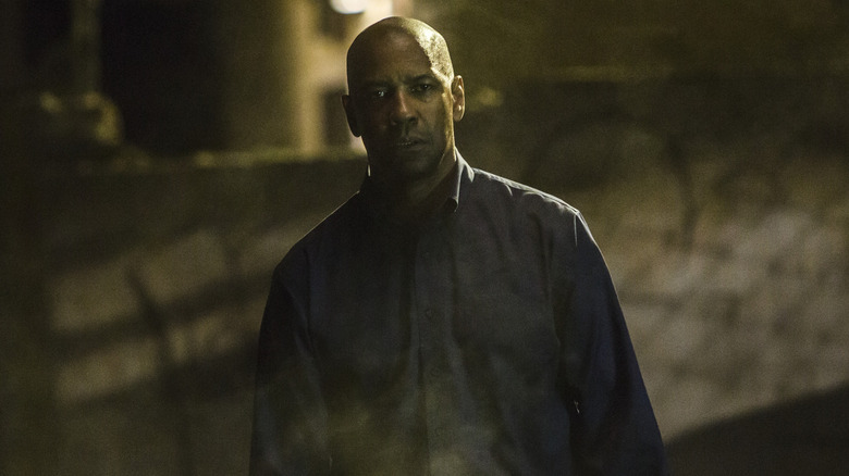 Denzel Washington like Robert McCar walks through the smoke in the equalizer