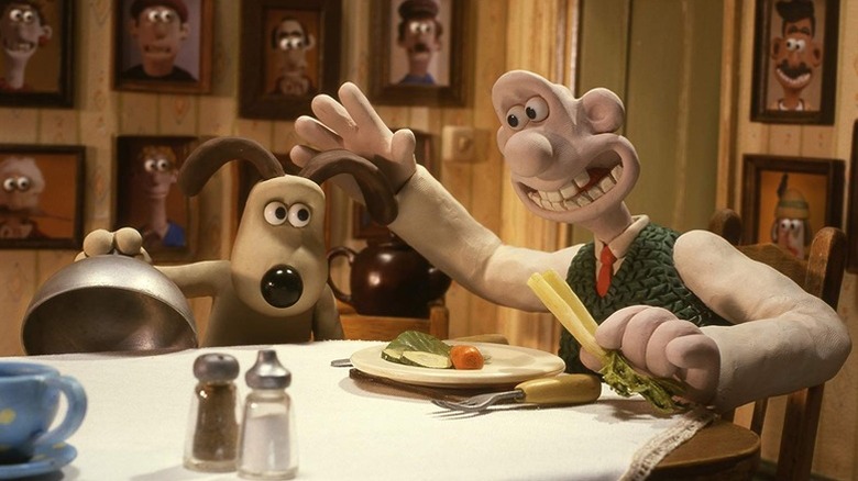 Wallace petting Gromit in Wallace & Gromit