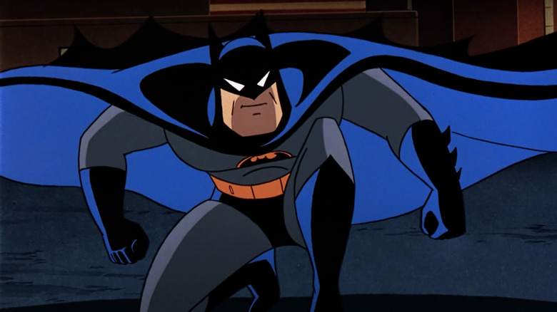 Batman sits crouched in Batman The Animated Series