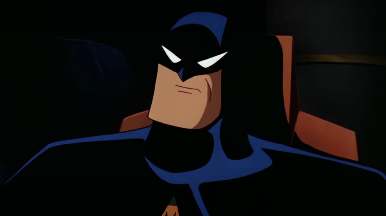 Batman sits in his chair and ponders in Batman: The Animated Series