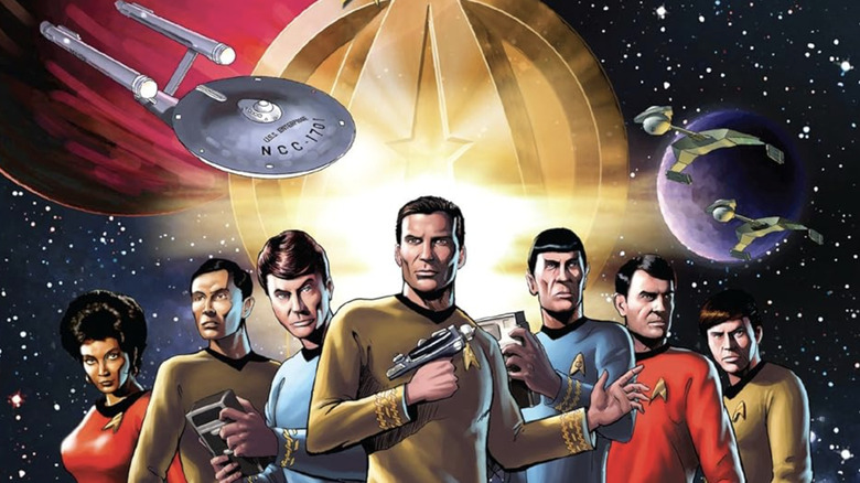 Star Trek the manga book cover line-up of the Enterprise crew: Uhura, Sulu, McCoy, Kirk, Spock, Scotty and Chekov