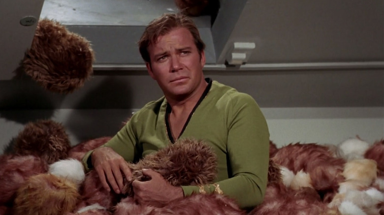 Star Trek Trouble with Tribbles Captain Kirk sitting in pile of tribbles