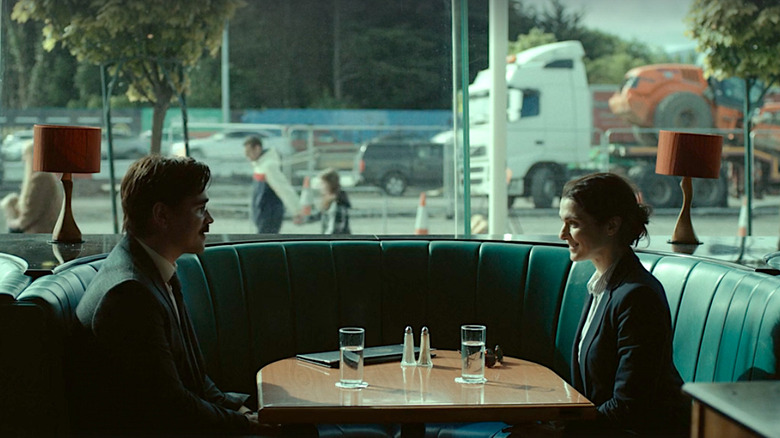Colin Farrell and Rachel Weisz sit in a cafe in The Lobster