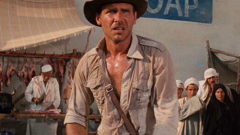 Indiana Jones looking exhausted in Raiders of the Lost Ark