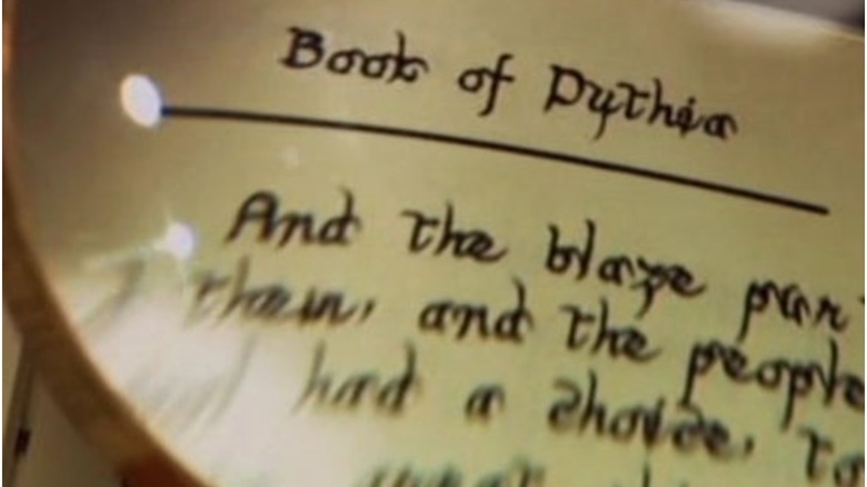 BSG Book of Pythia through magnifying glass