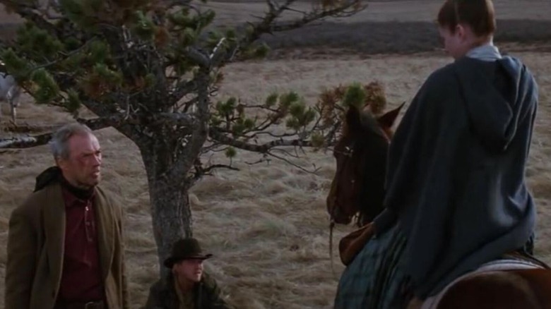 Clint Eastwood, Jaimz Woolvett and Tara Frederick in Unforgiven