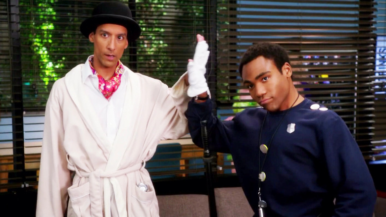 Abed and Troy high-fiving