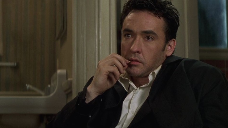 John Cusack en Identidad