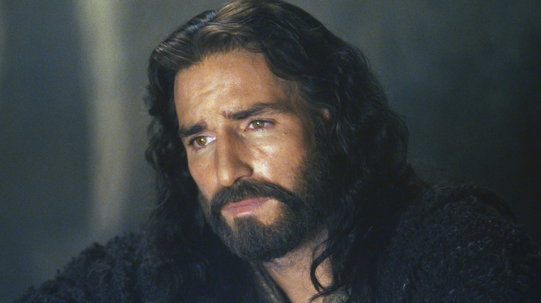 Jesus Christ staring in a dimly lit room in Passion of the Christ