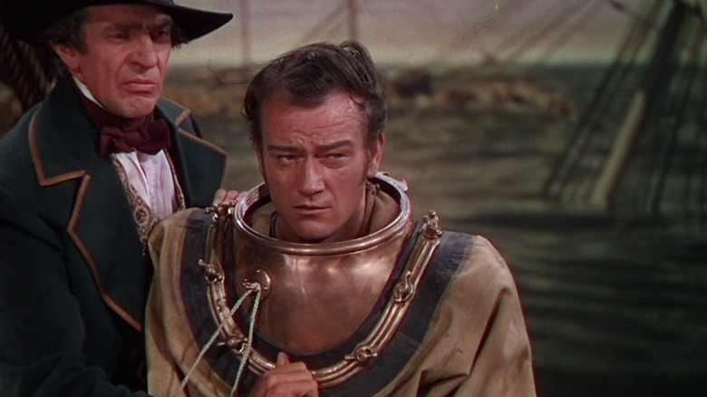 John Wayne as Jack Stuart in an old diving suit in Reap the Wild Wind