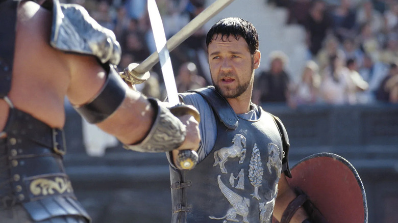 Maximus fighting with sword and shield in Gladiator