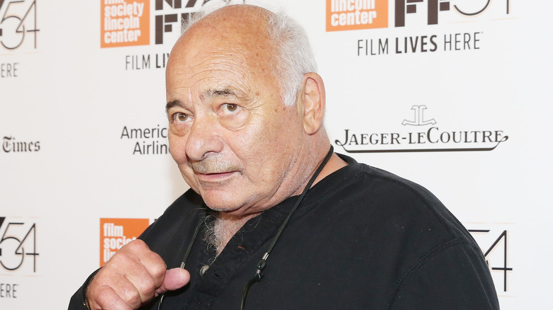 Burt Young attends film premiere wearing black shirt