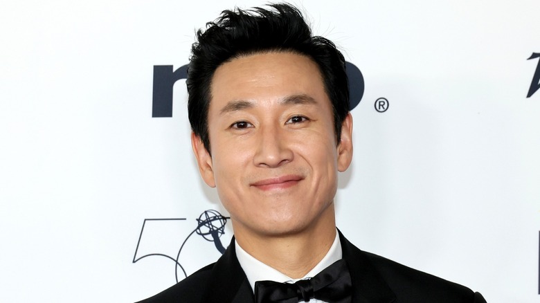 Lee Sun-kyun in suit at media event