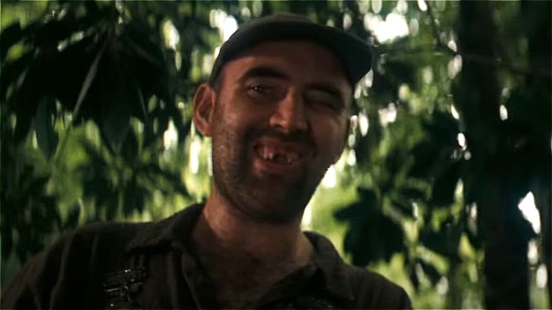 Herbert Coward in woods as toothless man in Deliverance