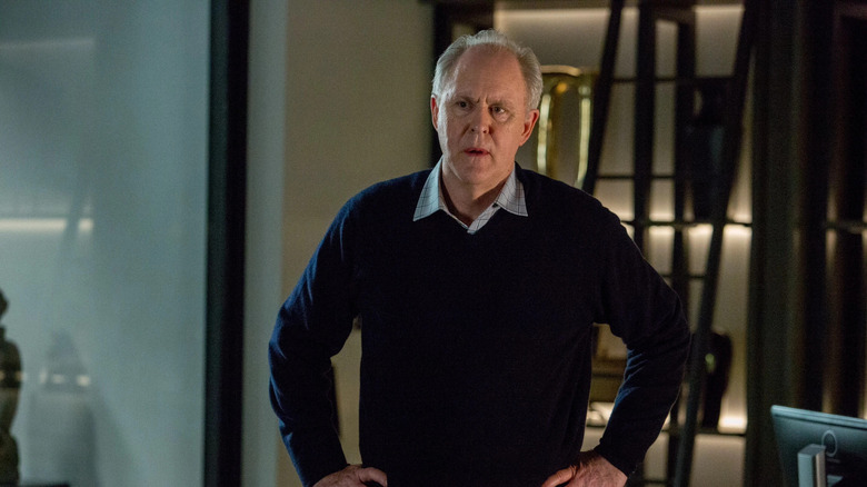 John Lithgow grimacing