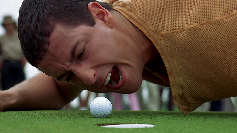 Adam Sandler gritando com uma bola de golfe em Happy Gilmore