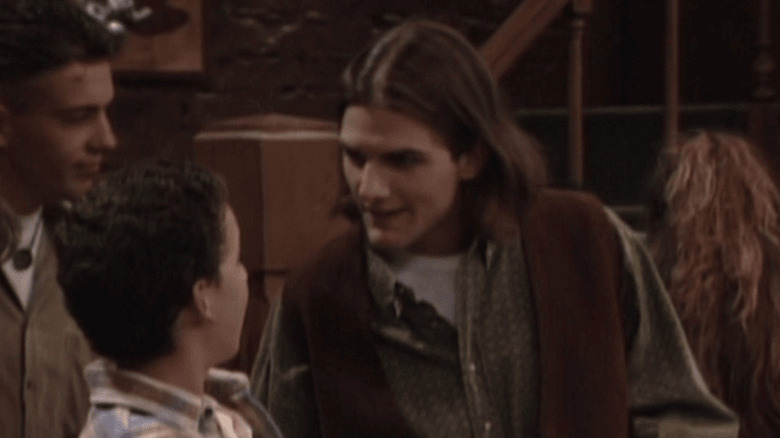 Senior looks down at Cory intimidatingly in Boy Meets World