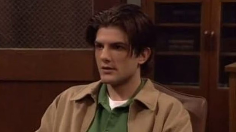 A close-up of Griff Hawkins sitting in the principal's office in Boy Meets World